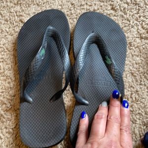 Like new Lacoste flip flops, size 7